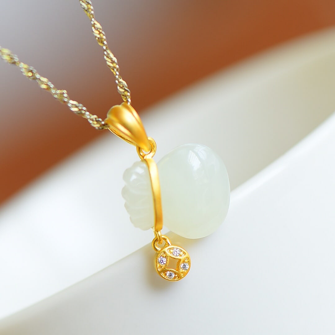 An Exquisite Sterling Silver-Gold Plated Inlaid White Jade Pendant , Inlaid Diamond: Sterling Silver-Gold Plated Inlaid White Jade Pendant , Inlaid Diamond , Size :0.5inx0.6in 