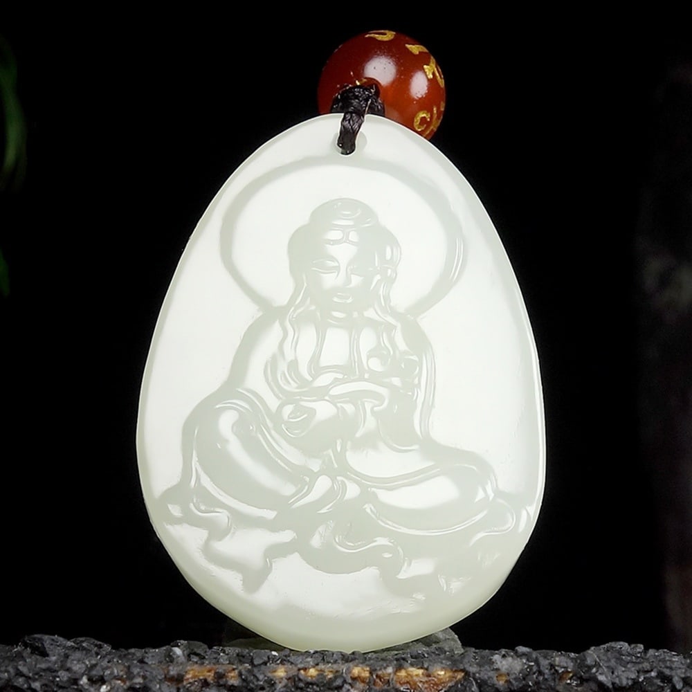 An Exquisite White Jade Statue of Avalokitesvara Pendant: An Exquisite White Jade Statue of Avalokitesvara Pendant,Size:1.3inx1inx0.3in 白玉观音像挂件