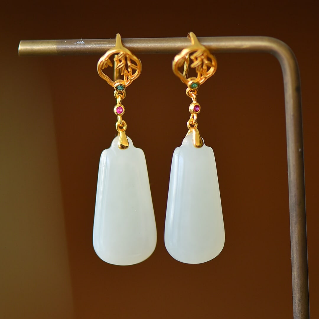 A Pair of Exquisite Sterling Silver-Gold Plated Inlaid White Jade Earrings: A Pair of Exquisite Sterling Silver-Gold Plated Inlaid White Jade Earrings,Size:0.5inx1.7in 一对纯银镀金镶白玉耳环