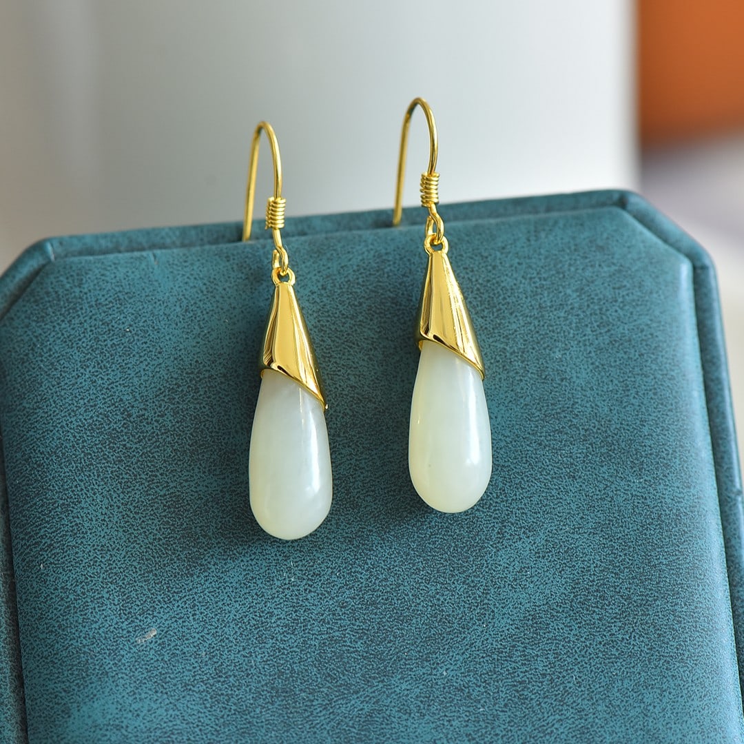 A Pair of Exquisite Sterling Silver-Gold Plated Inlaid White Jade Earrings: A Pair of Exquisite Sterling Silver-Gold Plated Inlaid White Jade Earrings,Size: 0.3inx0.7in 一对纯银镀金镶白玉耳环