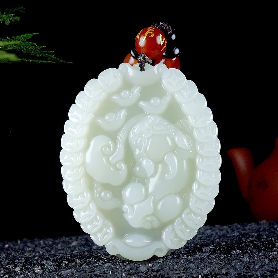 An Exquisite White Jade Auspicious Beast Pendant: An Exquisite White Jade Auspicious Beast Pendant,Size:2inx1.7inx0.3in 白玉貔貅挂件