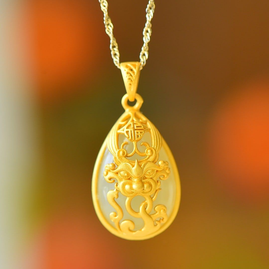 An Exquisite Sterling Silver-Gold Plated Inlaid White Jade Pendant: An Exquisite Sterling Silver-Gold Plated Inlaid White Jade Pendant,Size:0.6inx0.9in 纯银镀金镶白玉吊坠