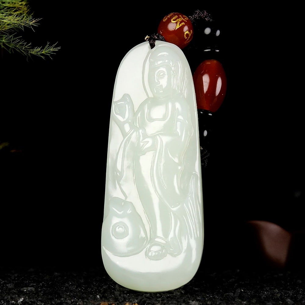 An Exquisite White Jade Statue of Avalokitesvara Pendant: An Exquisite White Jade Statue of Avalokitesvara Pendant,Size:2.1inx0.8inx0.4in 白玉观音像挂件