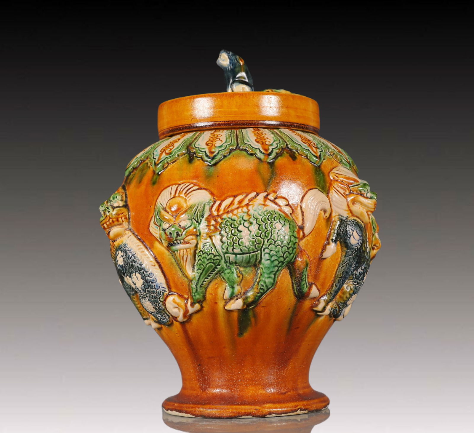 A Rare Tang Tri-Color Glazed Pottery Auspicious Beast Pattern Cover Jar (1 of 10)