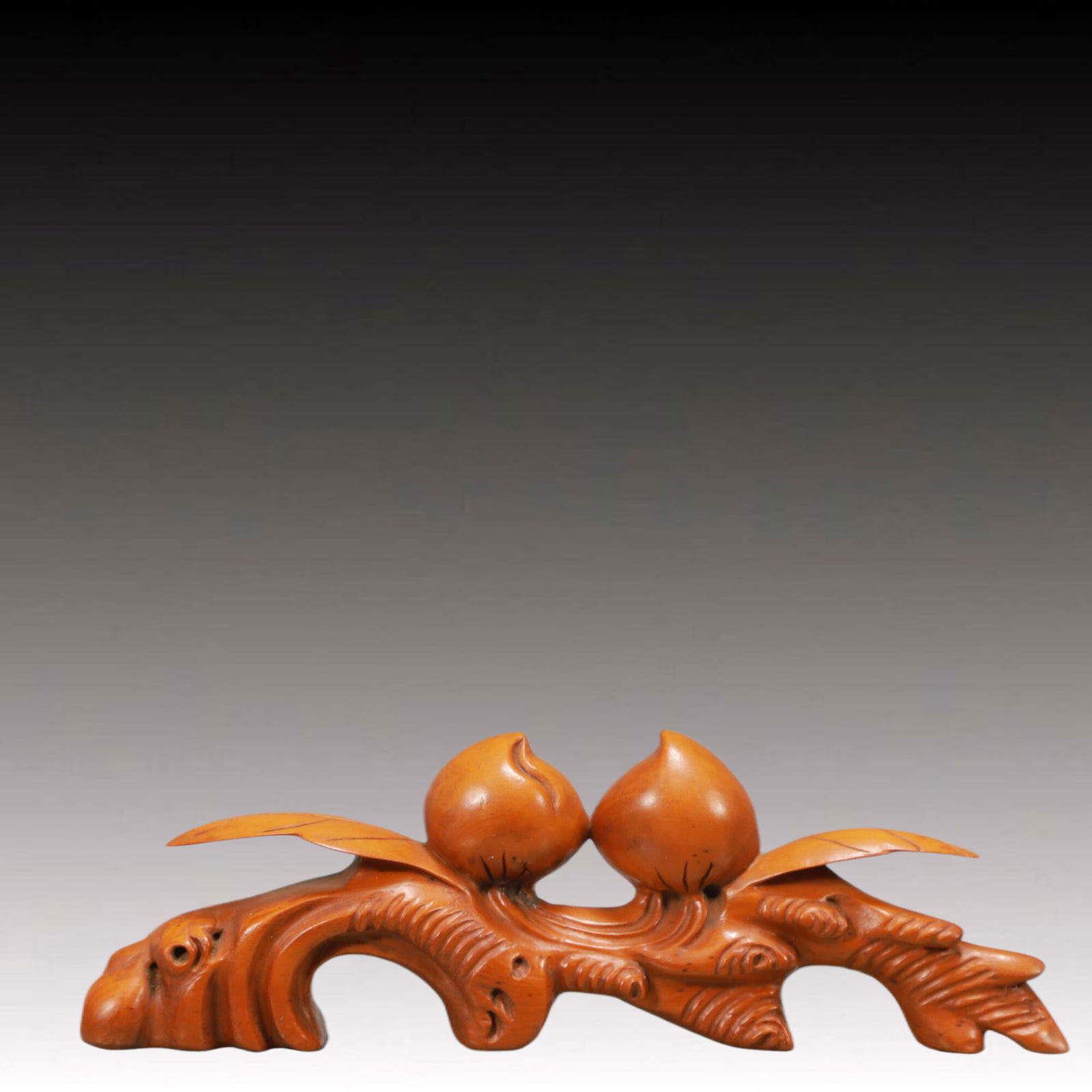 An Exquisite Boxwood Peach-Shaped Brush Holder: An Exquisite Boxwood Peach-Shaped Brush Holder,Qing Dynasty,China,Size:3inx1inx2.1in,Weight:100g 黄杨木桃形笔架,中国清代