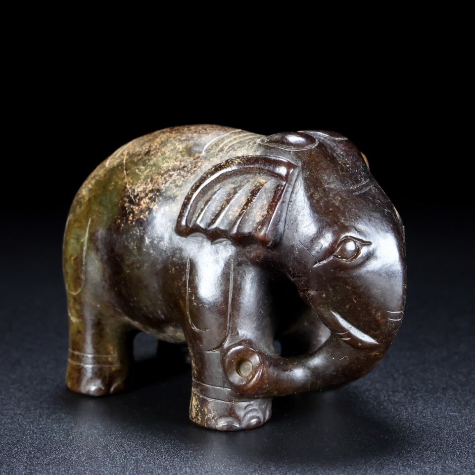 An Exquisite Archaic Jade Elephant Ornament (1 of 9)