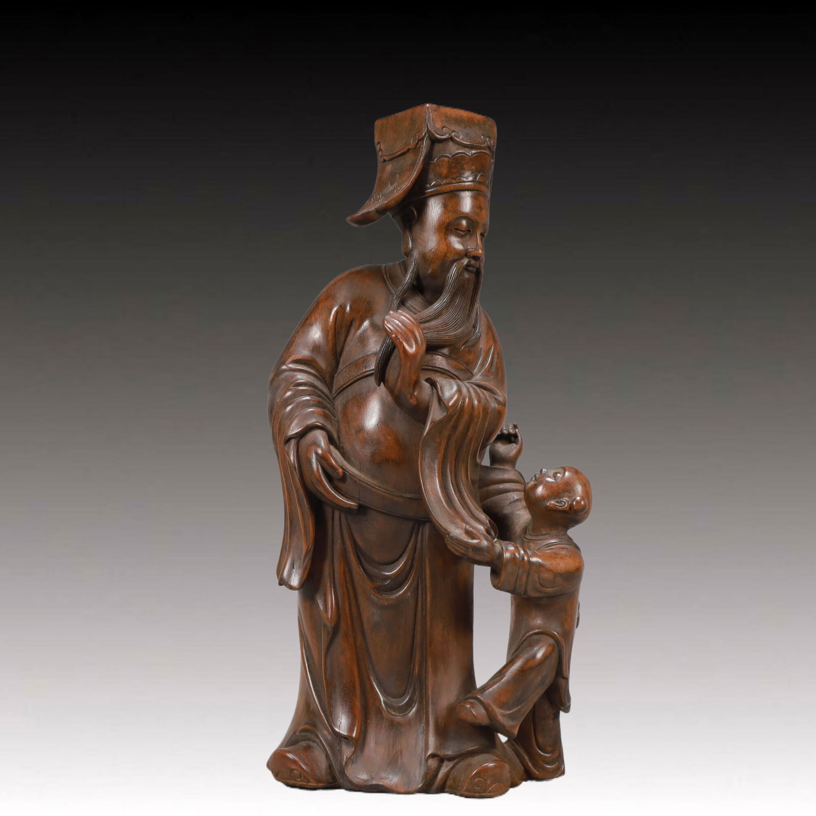 A Rare Zitanwood Figure Ornament: A Rare Zitanwood Figure Ornament,Qing Dynasty,China,Size:5inx2.8inx11.1in,Weight:950g 紫檀木人物摆件,中国清代