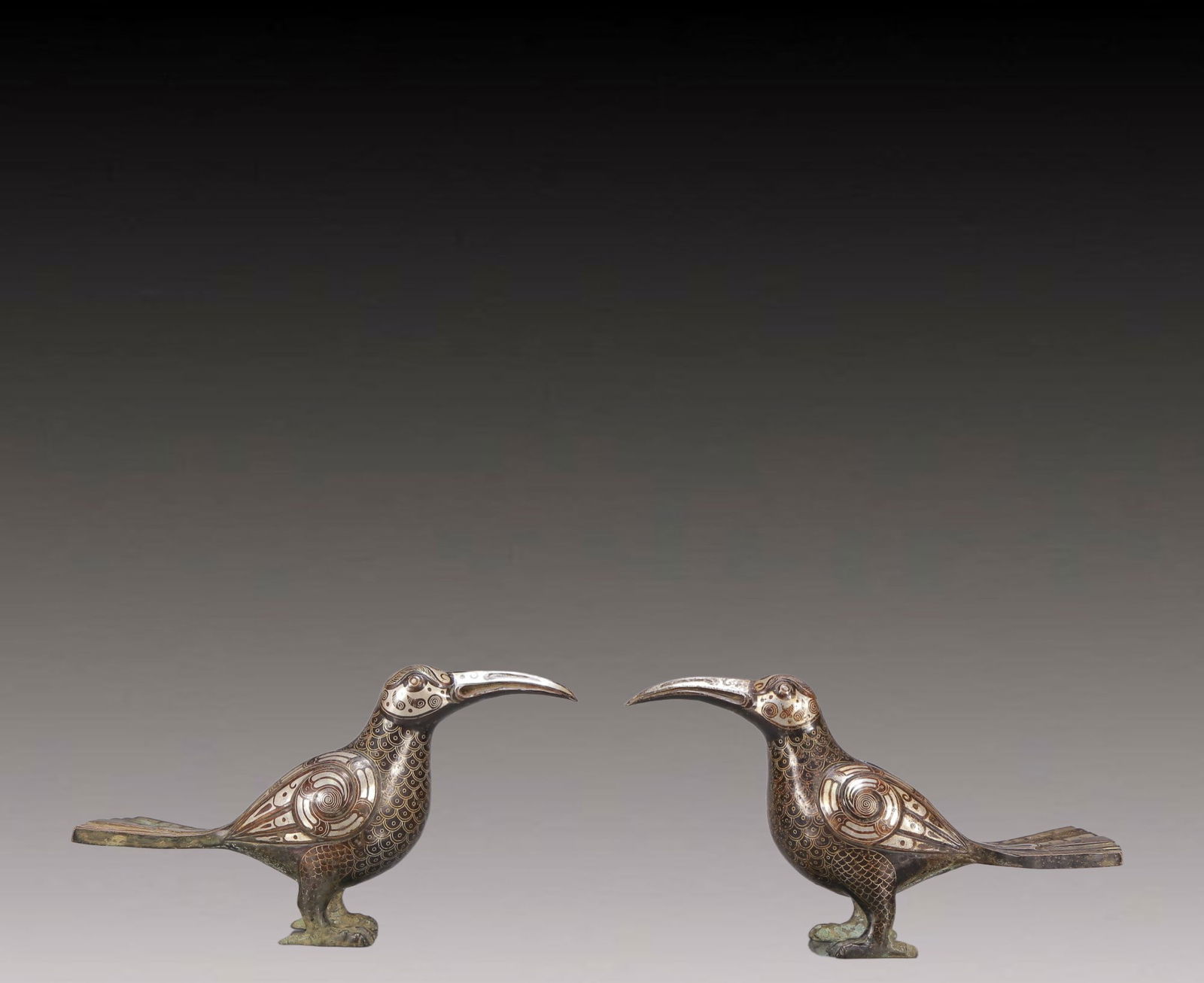 A Exquisite A pair of Gilt Bronze Silver-Inlaid Bronze Bird Ornament: A Exquisite A pair of Gilt Bronze Silver-Inlaid Bronze Bird Ornament Ancient Time, China ,Size:7.9inx2.4inx4.3in Weight:1200g 一对铜鎏金错银鸟