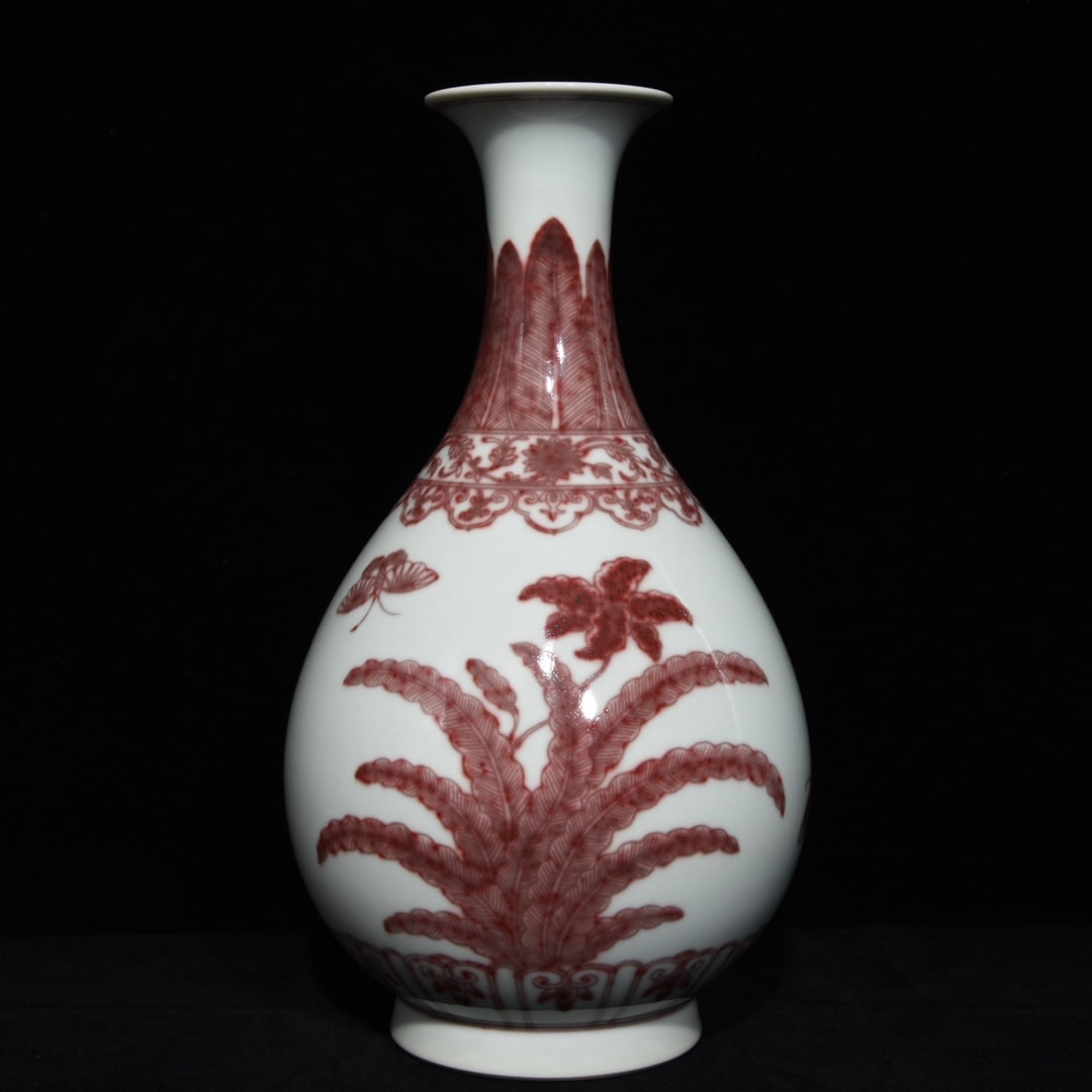 A Rare Underglaze-Red Flower and Butterfly Pattern Vase: A Rare Underglaze-Red Flower and Butterfly Pattern Vase,Qing Dynasty,China,Qianlong Six-character Mark,Size:13.6inx7.5in 