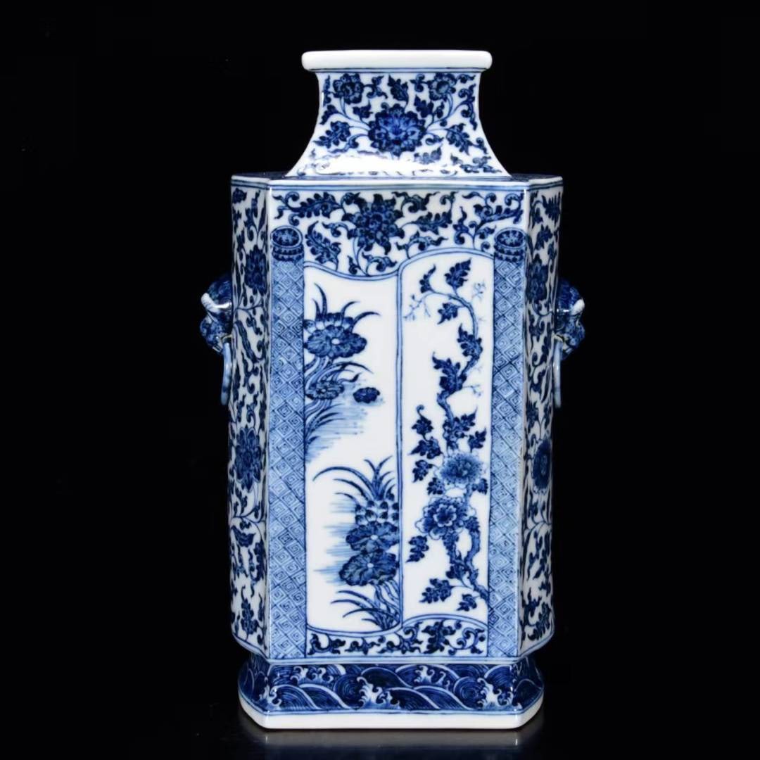 An Exquisite Blue and White Flower and Bird Pattern Beast-Ears Vase: An Exquisite Blue and White Flower and Bird Pattern Beast-Ears Vase,Qing Dynasty,China,Qianlong Six-character Mark,Size:13.4inx7.9in 