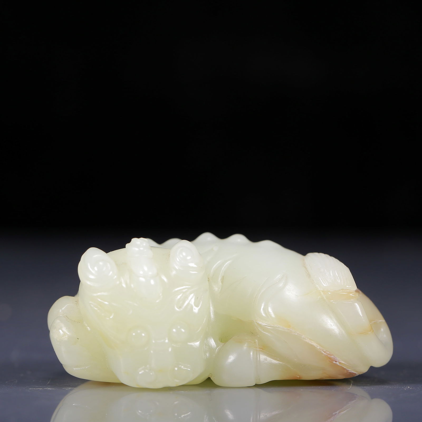 An Exquisite White Jade Auspicious Beast Ornament: An Exquisite White Jade Auspicious Beast Ornament ,Qing Dynasty, China,Size:2.8inx1.6inx1.2in,Weight:125g 白玉瑞兽摆件，清代