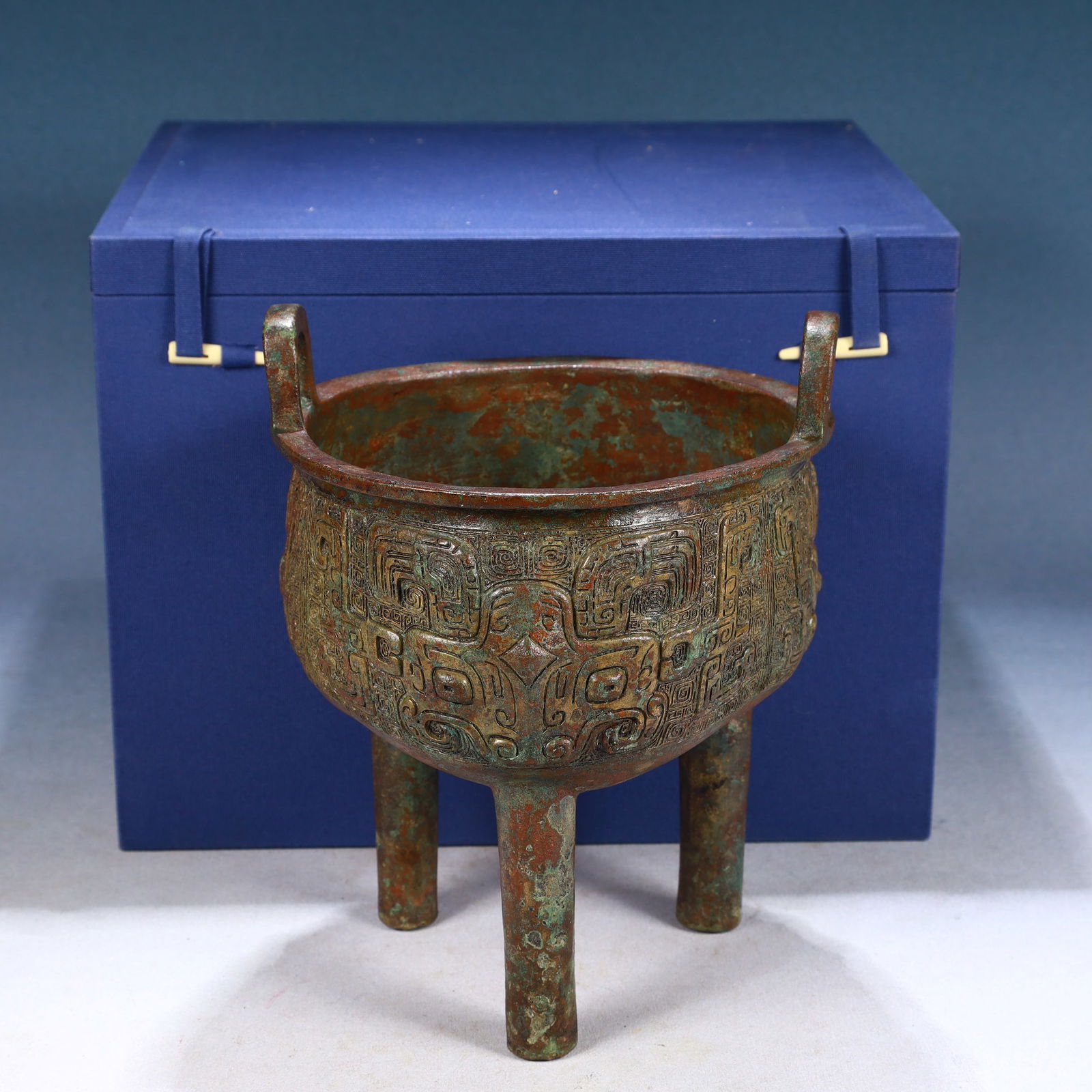 An Archaic Bronze Beast-Face Pattern Double-Ears and Tripod Censer: An Archaic Bronze Beast-Face Pattern Double-Ears and Tripod Censer,Qing Dynasty, China,Size:7.5inx9.4in,Weight:2750g 