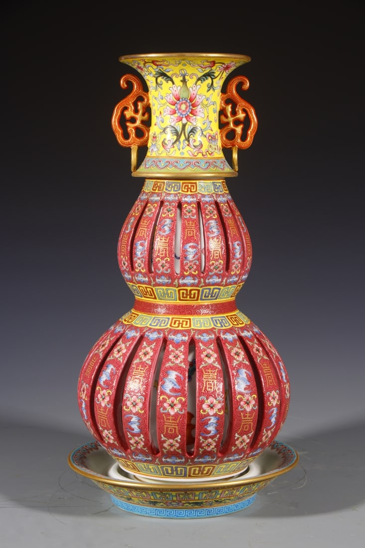 An Exquisite Enamel Ruby Red-Glazed Bats and Peach Pattern Double-Ears Gourd-Shaped Vase: An Exquisite Enamel Ruby Red-Glazed Bats and Peach Pattern Double-Ears Gourd-Shaped Vase,Qing Dynasty,China,Qianlong Six-character Mark,Size:15.7inx5.1in 