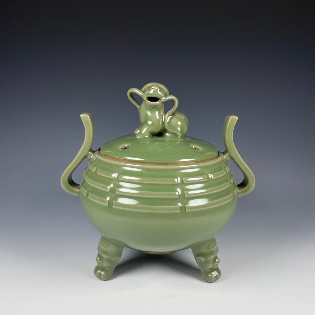 An Exquisite Longquan yao Celadon Glazed Double-Ears and Tripod Censer (1 of 9)