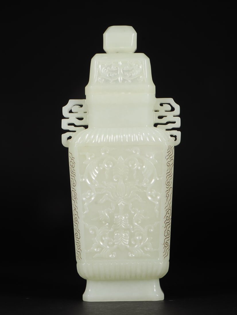 An Exquisite White Jade Lotus Pattern Double-Ears Bottle: An Exquisite White Jade Lotus Pattern Double-Ears Bottle,Qing Dynasty,China,Size:3.7inx1.9inx8.5in,Weight:568g 白玉缠枝莲纹双耳盖瓶,中