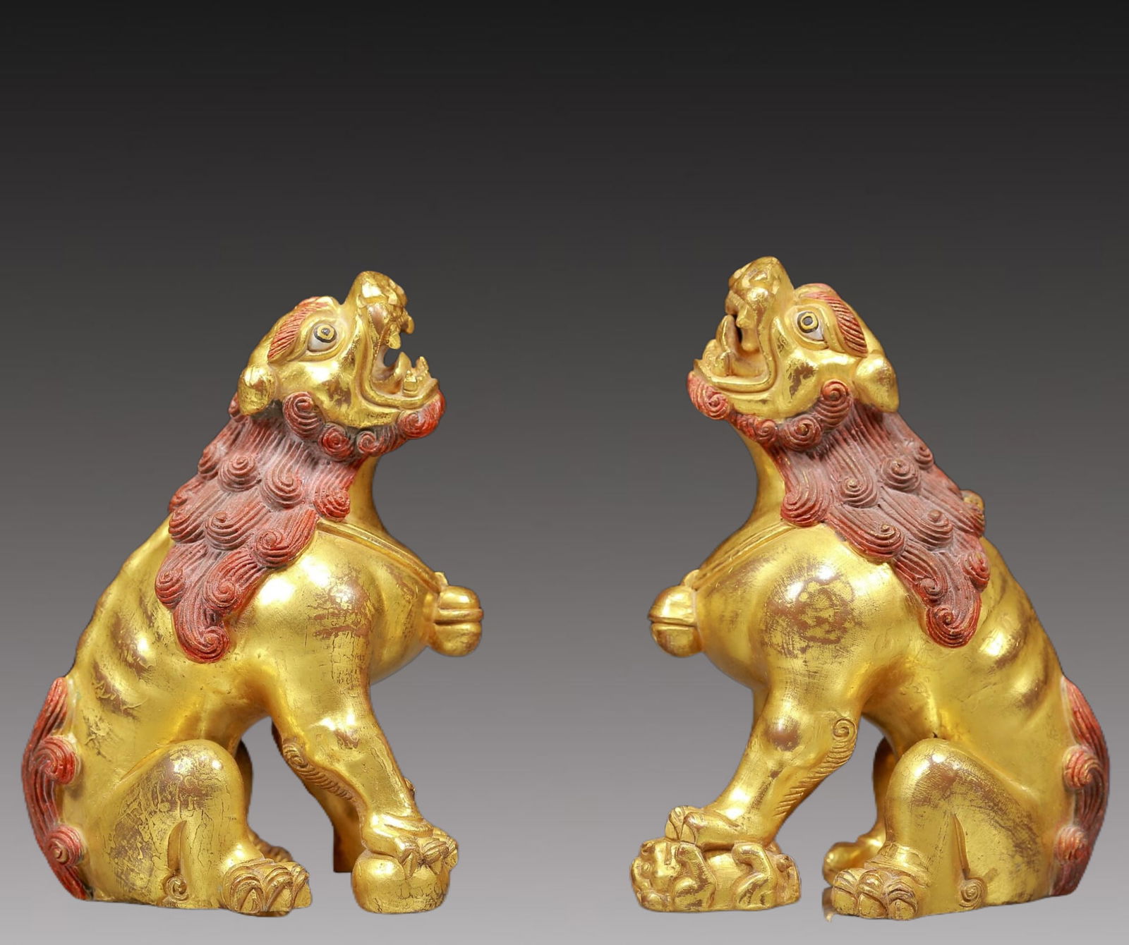 A Pair of Rare Gilt Bronze Lion Ornaments: A Pair of Rare Gilt Bronze Lion Ornaments,Ming Dynasty, China,Size:3.5inx2.6inx5.1in,Weight:1085g 一对铜鎏金狮子摆件，明代