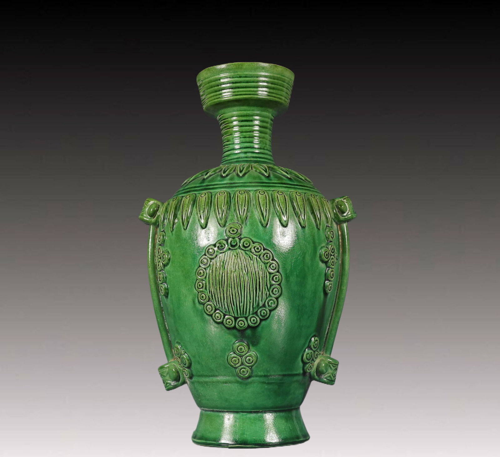 An Exquisite Tang Tri-Color Glazed Pottery Flower Pattern Vase: An Exquisite Tang Tri-Color Glazed Pottery Flower Pattern Vase,Tang Dynasty, China,Size:6.7inx6.3inx11in,Weight:1050g 唐三彩花卉纹瓶，中国&#