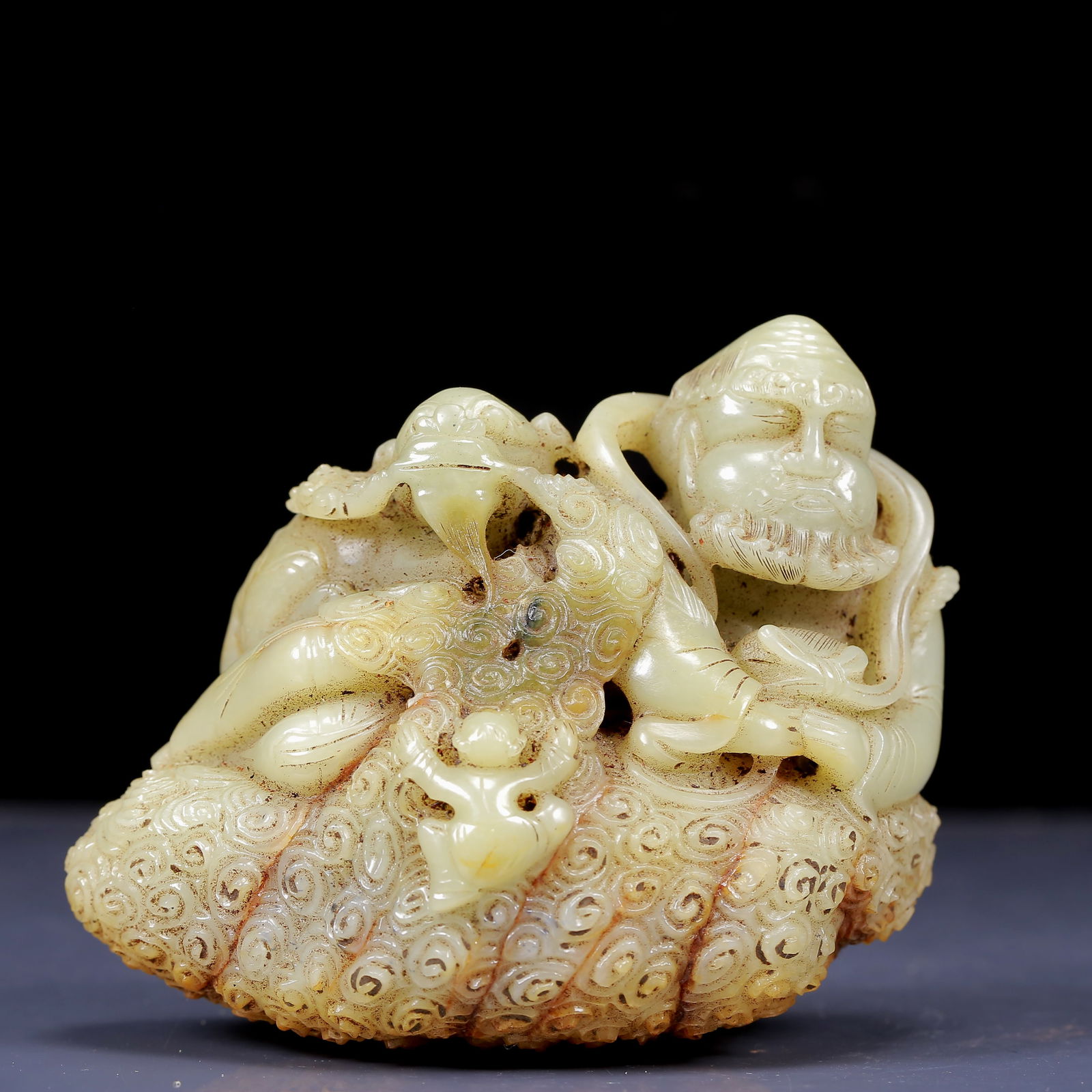 An Exquisite White Jade Statue of Arhat Ornament: An Exquisite White Jade Statue of Arhat Ornament, Qing Dynasty, China,Size:5.5inx3.1inx4.3in,Weight:1630g 白玉降狮罗汉摆件，清代