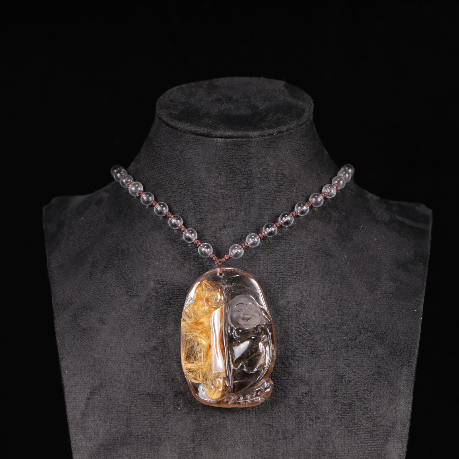 An Exquisite Crystal Statue of Maitreya Buddha Pendant: An Exquisite Crystal Statue of Maitreya Buddha Pendant,Size:1.6inx0.6inx2.4in,Weight:74g 水晶弥勒佛挂件