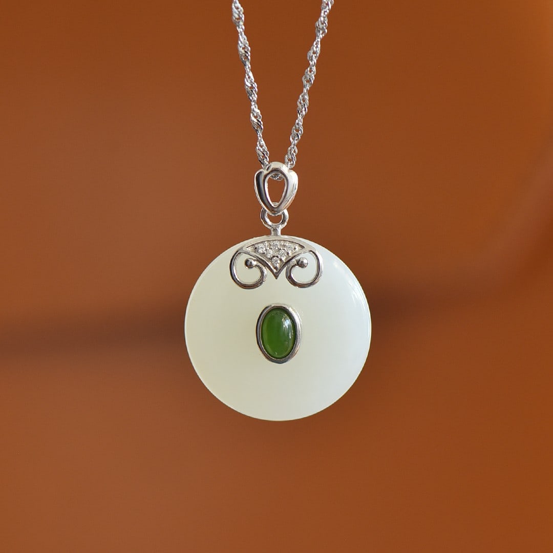 An Exquisite Sterling Silver Inlaid White Jade Pendant: An Exquisite Sterling Silver Inlaid White Jade Pendant,Size:0.9inx0.9in 纯银镶白玉吊坠