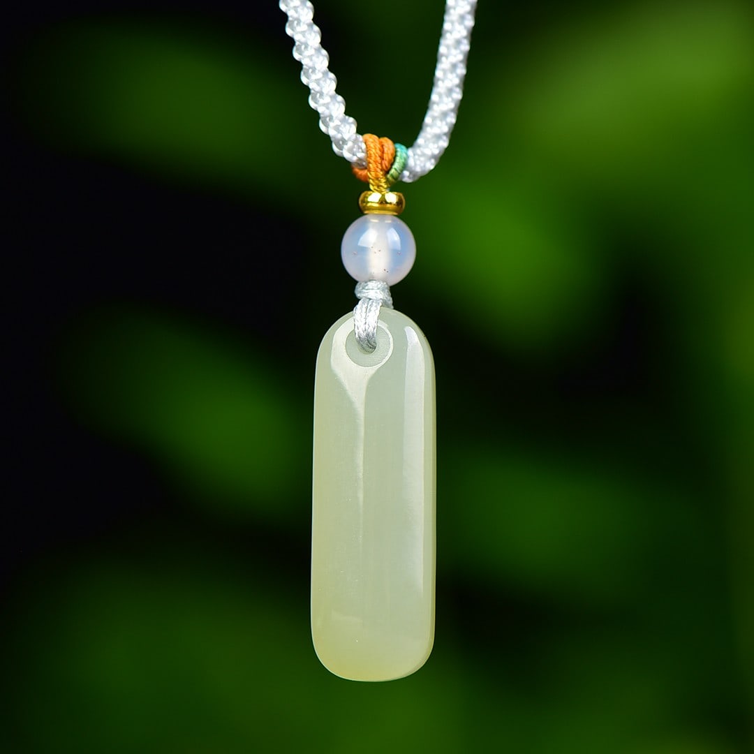 An Exquisite Greenish Jade Pendant (1 of 4)