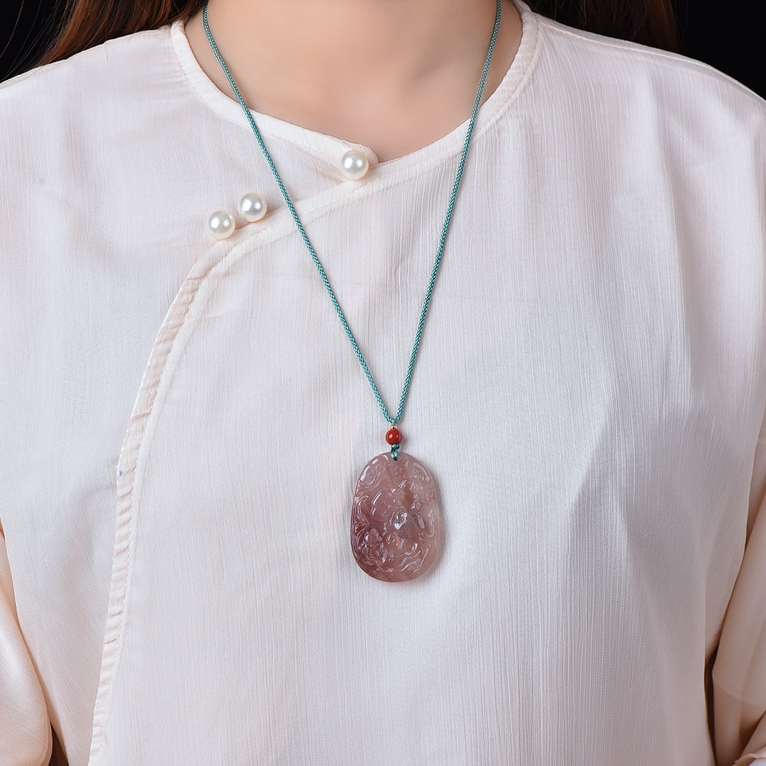 An Exquisite Red Jade Auspicious Cloud Pattern Pendant (1 of 3)