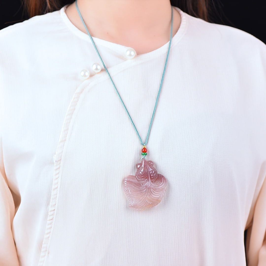 An Exquisite Red Jade Fish Pattern Pendant (1 of 2)