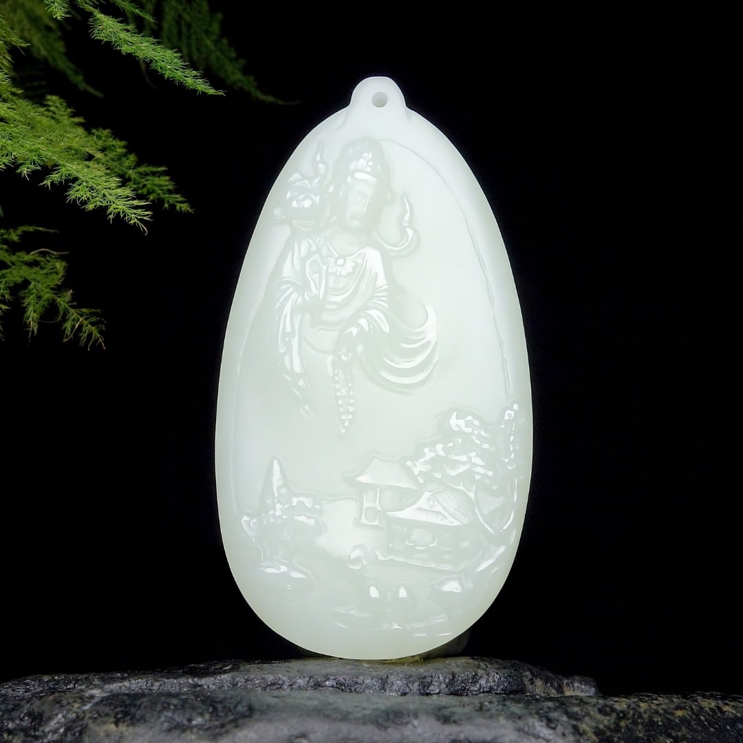 An Exquisite White Jade Statue of Avalokitesvara Pendant: An Exquisite White Jade Statue of Avalokitesvara Pendant,Size:2inx1.1inx0.3in 白玉观音像挂件