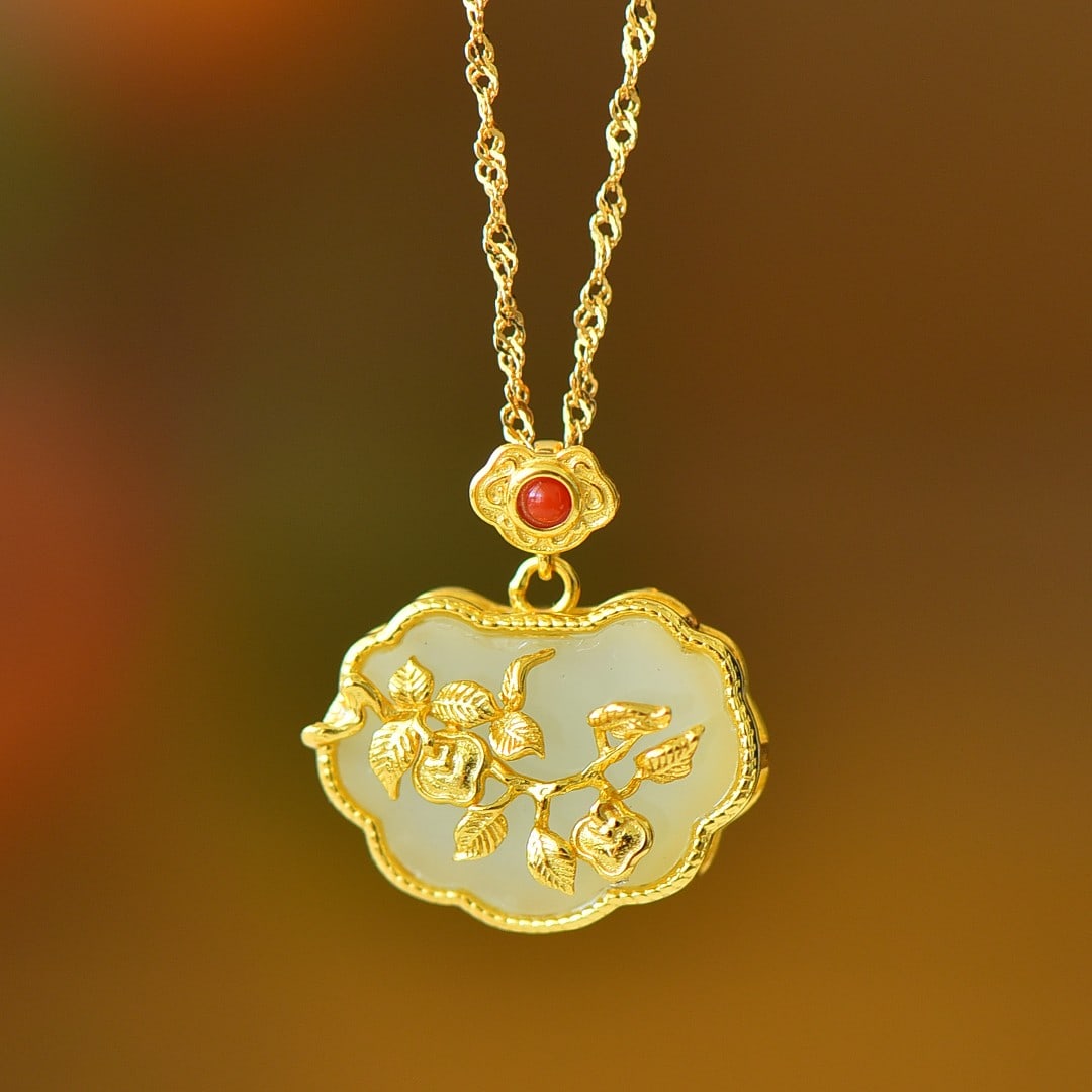 An Exquisite Sterling Silver-Gold Plated Inlaid White Jade Pendant: An Exquisite Sterling Silver-Gold Plated Inlaid White Jade Pendant,Size:0.6inx0.7in 纯银镀金镶白玉吊坠