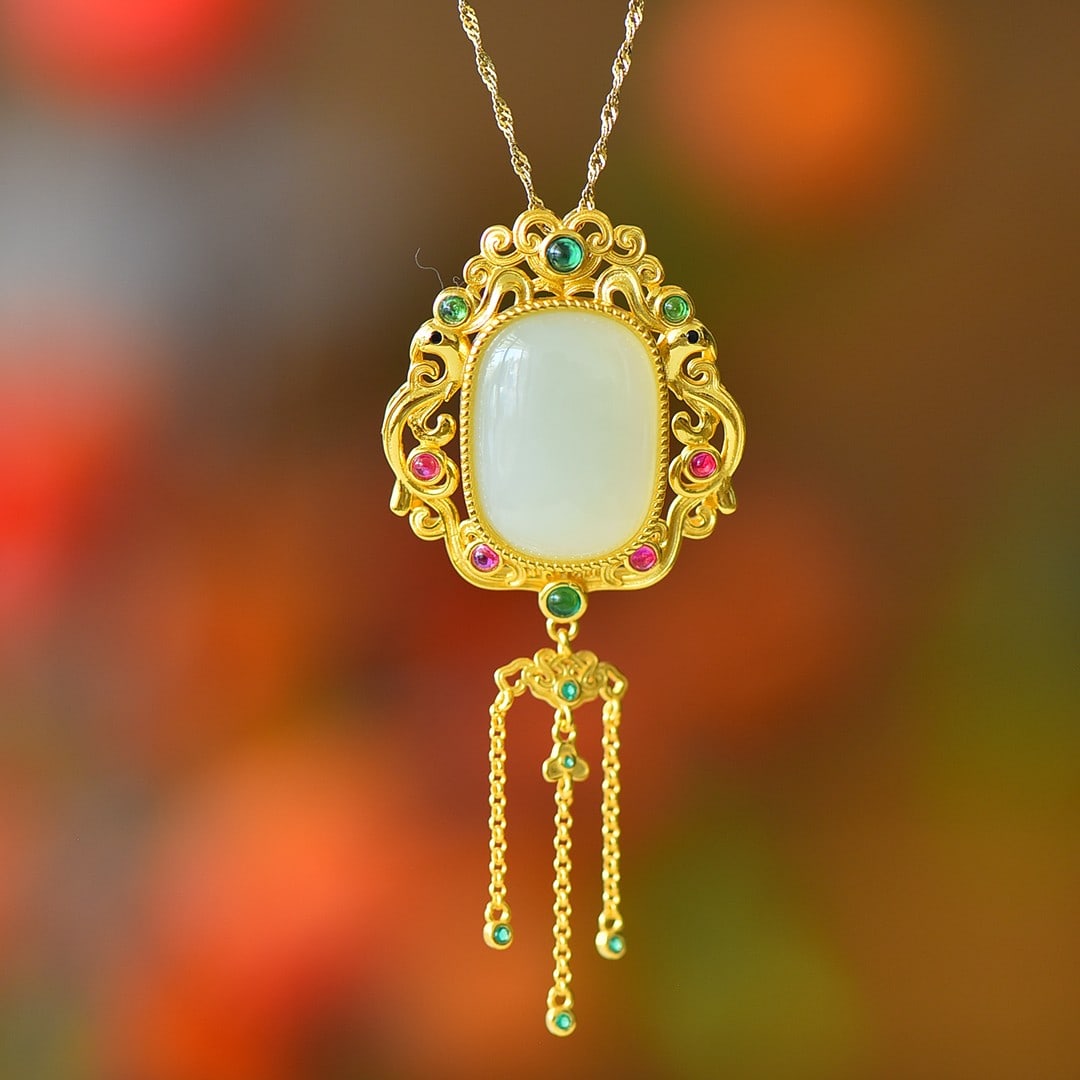An Exquisite Sterling Silver-Gold Plated Inlaid White Jade Pendant: An Exquisite Sterling Silver-Gold Plated Inlaid White Jade Pendant 纯银镀金镶白玉吊坠