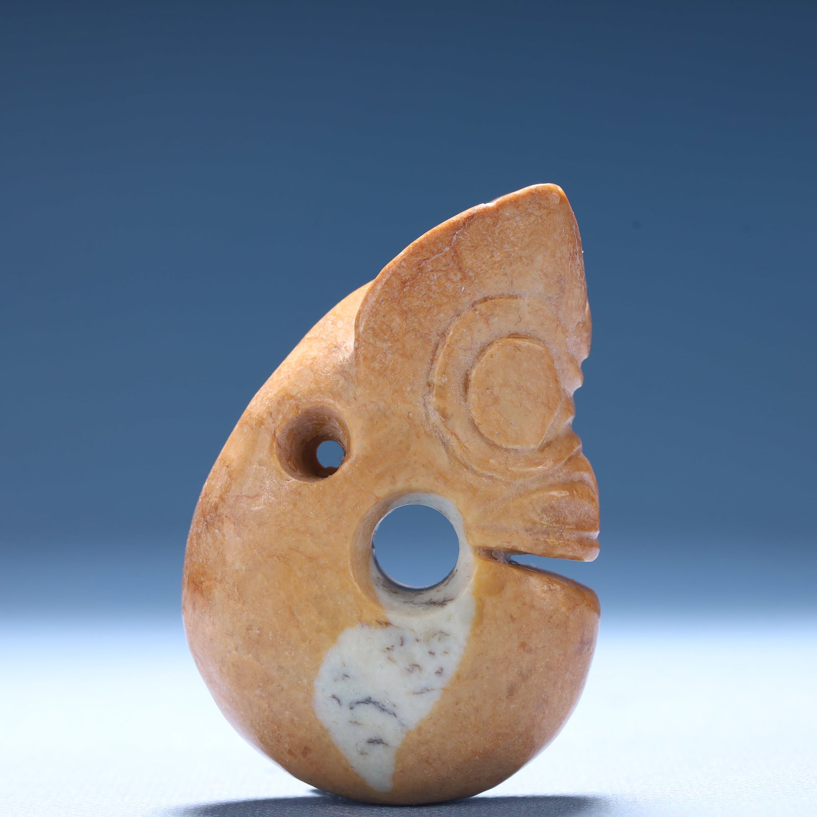 An Archaic Hongshan Culture Yellow Jade Pig and Dragon Ornament: An Archaic Hongshan Culture Yellow Jade Pig and Dragon Ornament,Ancient Time,China,Size:4.6cmx2.2cmx6.8cm,Weight:95.9g 红山文化黄玉猪龙摆件,