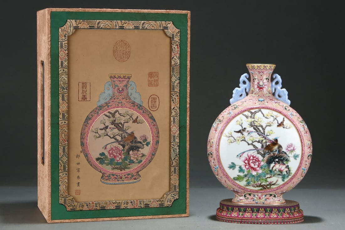 An Exquisite Famille-Rose Flower and Bird Pattern Double-Ears Vase: An Exquisite Famille-Rose Flower and Bird Pattern Double-Ears Vase,Qing Dynasty,China,Qianlong Four-character Mark,Size:10.9inx8.1in 