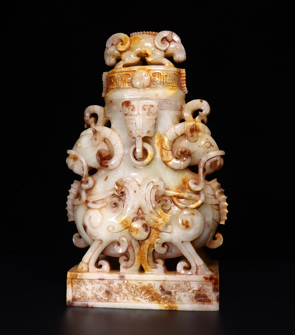 A Rare White Jade Sheep Pattern Vase with Cover: A Rare White Jade Sheep Pattern Vase with Cover,Qing Dynasty, China,Size:8.3inx4.3inx13.6in,Weight:7747g 白玉羊纹盖瓶,中国清代
