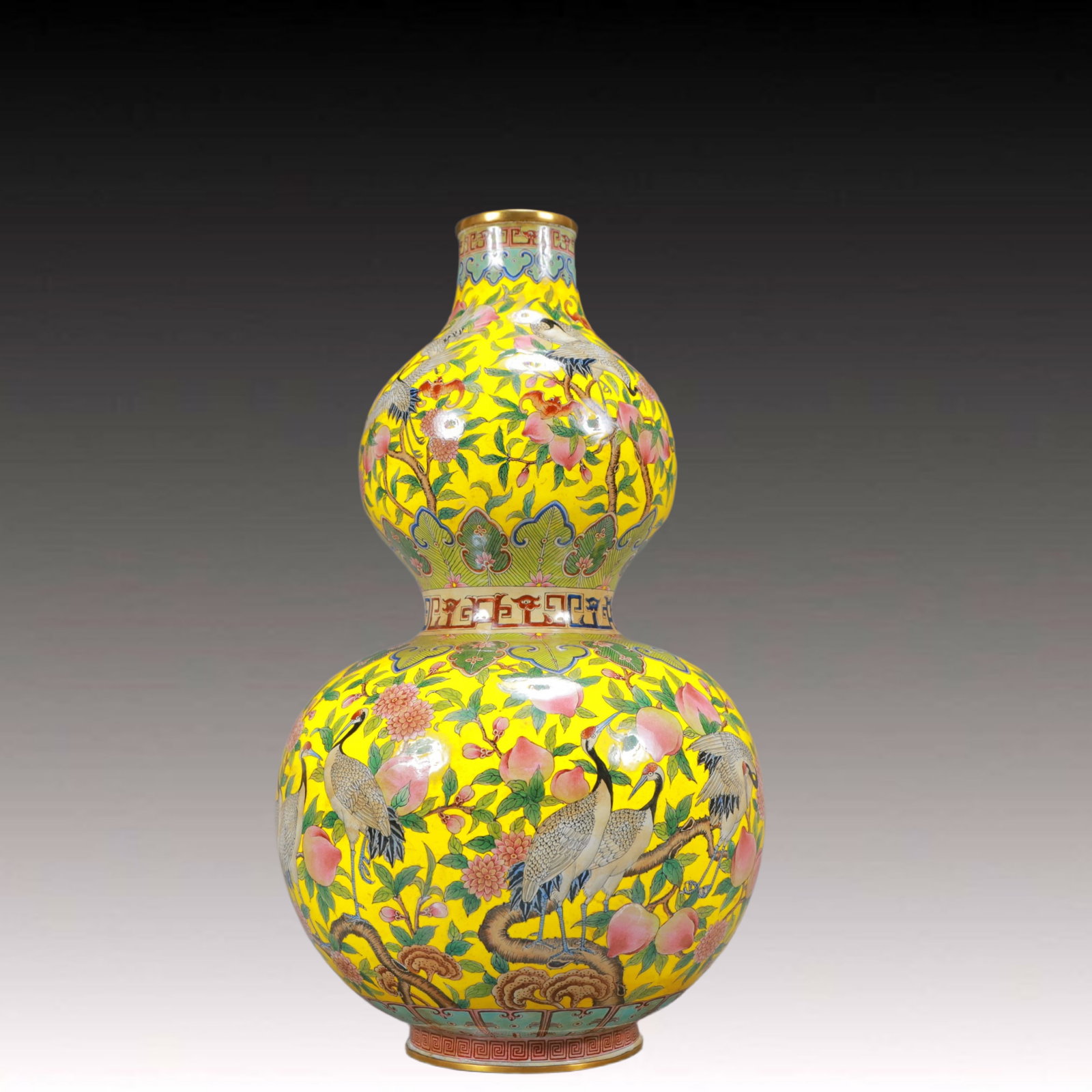 A Rare Painted Enamel Crane and Peach Pattern Gourd-Shaped Vase: A Rare Painted Enamel Crane and Peach Pattern Gourd-Shaped Vase,Qing Dynasty, China,Qianlong Four-character Mark,Size:7.9inx12.6in,Weight:1450g 画珐琅鹤寿纹葫