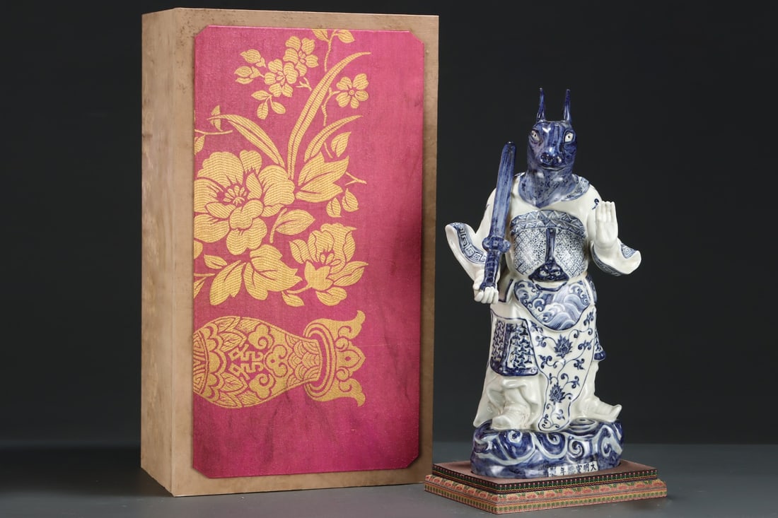 An Exquisite Blue and White Lotus Pattern Buffalo Ornament: An Exquisite Blue and White Lotus Pattern Buffalo Ornament,Ming Dynasty,China,Xuande Six-character Mark,Size:18.1inx9.4in 