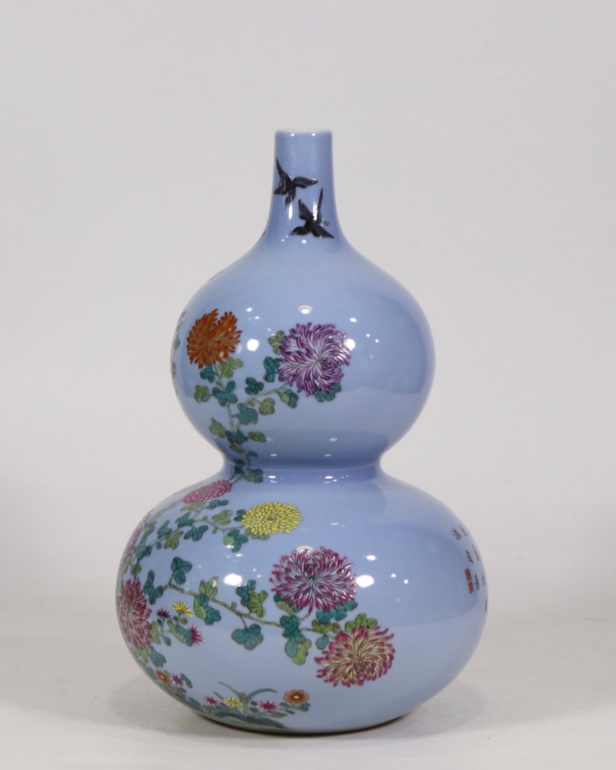 An Exquisite Sky Blue Glazed Famille-Rose Flower and Bird Pattern Gourd-Shaped Vase,with poem: An Exquisite Sky Blue Glazed Famille-Rose Flower and Bird Pattern Gourd-Shaped Vase,with poem,Qing Dynasty,China,Qianlong Six-character Mark,Size:12.6inx7.3in 
