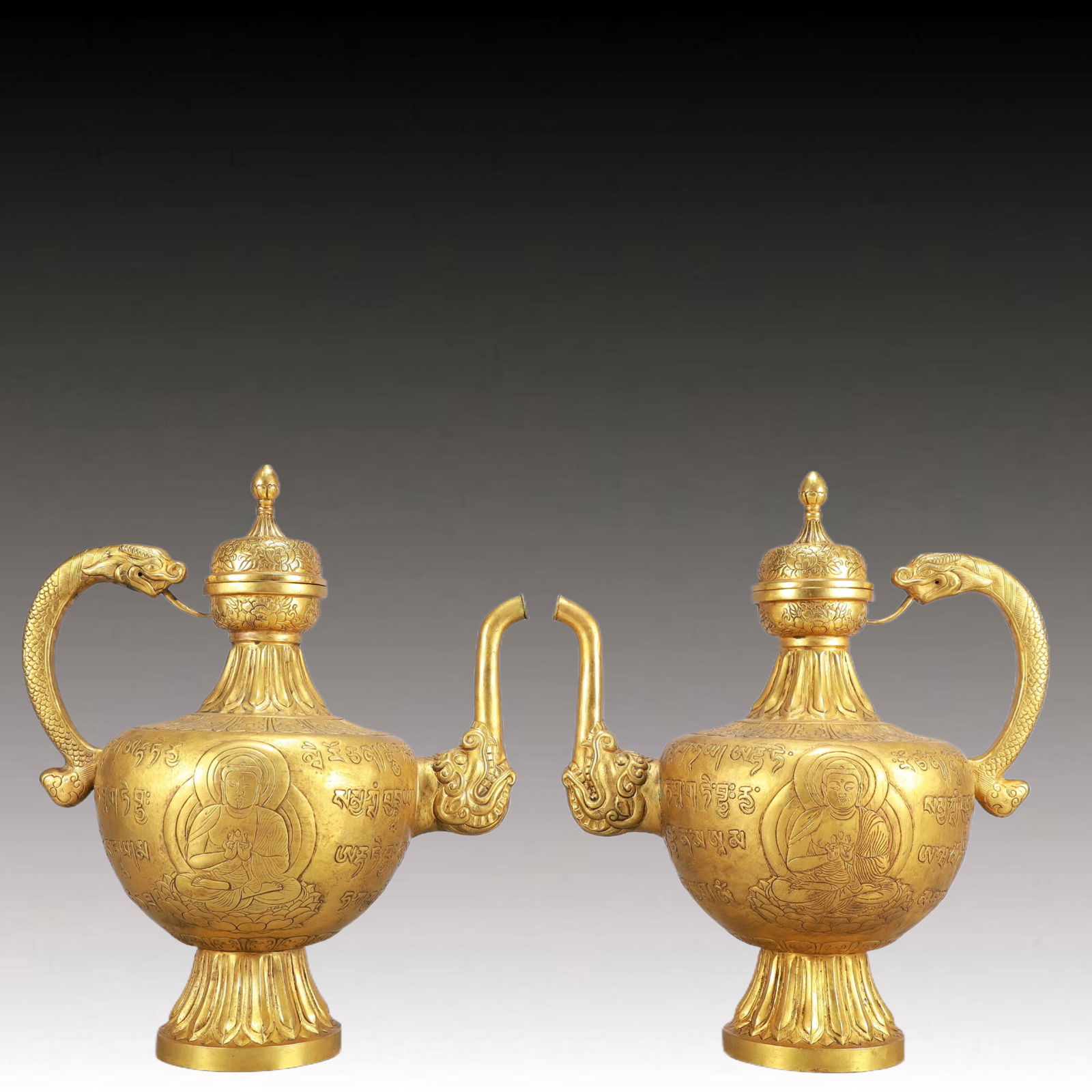 A Pair of Rare Gilt Bronze Buddha Statue Pattern Ewers: A Pair of Rare Gilt Bronze Buddha Statue Pattern Ewers,Ming Dynasty, China,Size:10.2inx6.3inx11.8in,Weight:2600g 