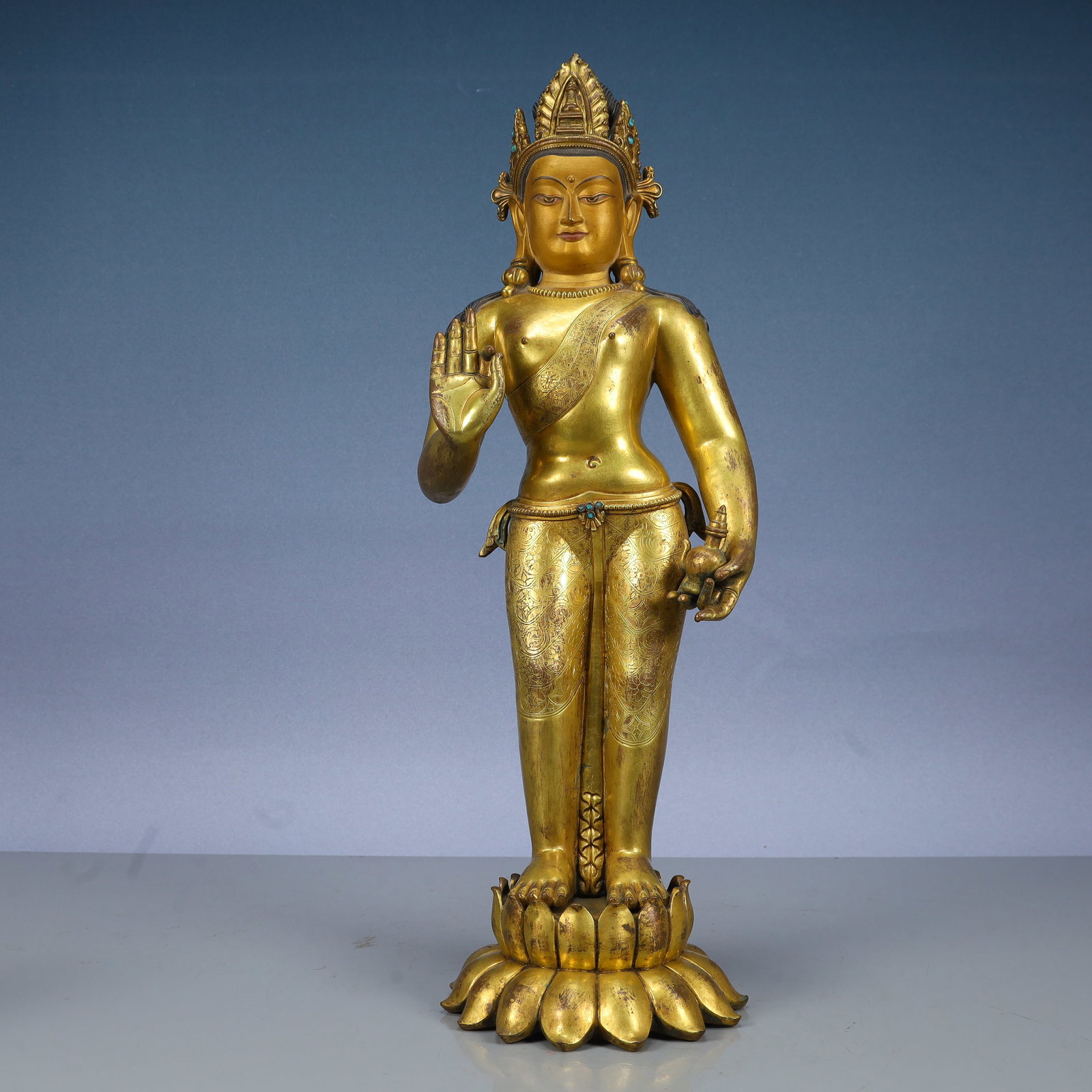 A Solemn Gilt Bronze Statue of Avalokitesvara,Inlaid Turquoise: A Solemn Gilt Bronze Statue of Avalokitesvara,Inlaid Turquoise,Ming Dynasty, China,Yongle Six-character Mark,Size:7.5inx5.9inx20.1in,Weight:7150g 
