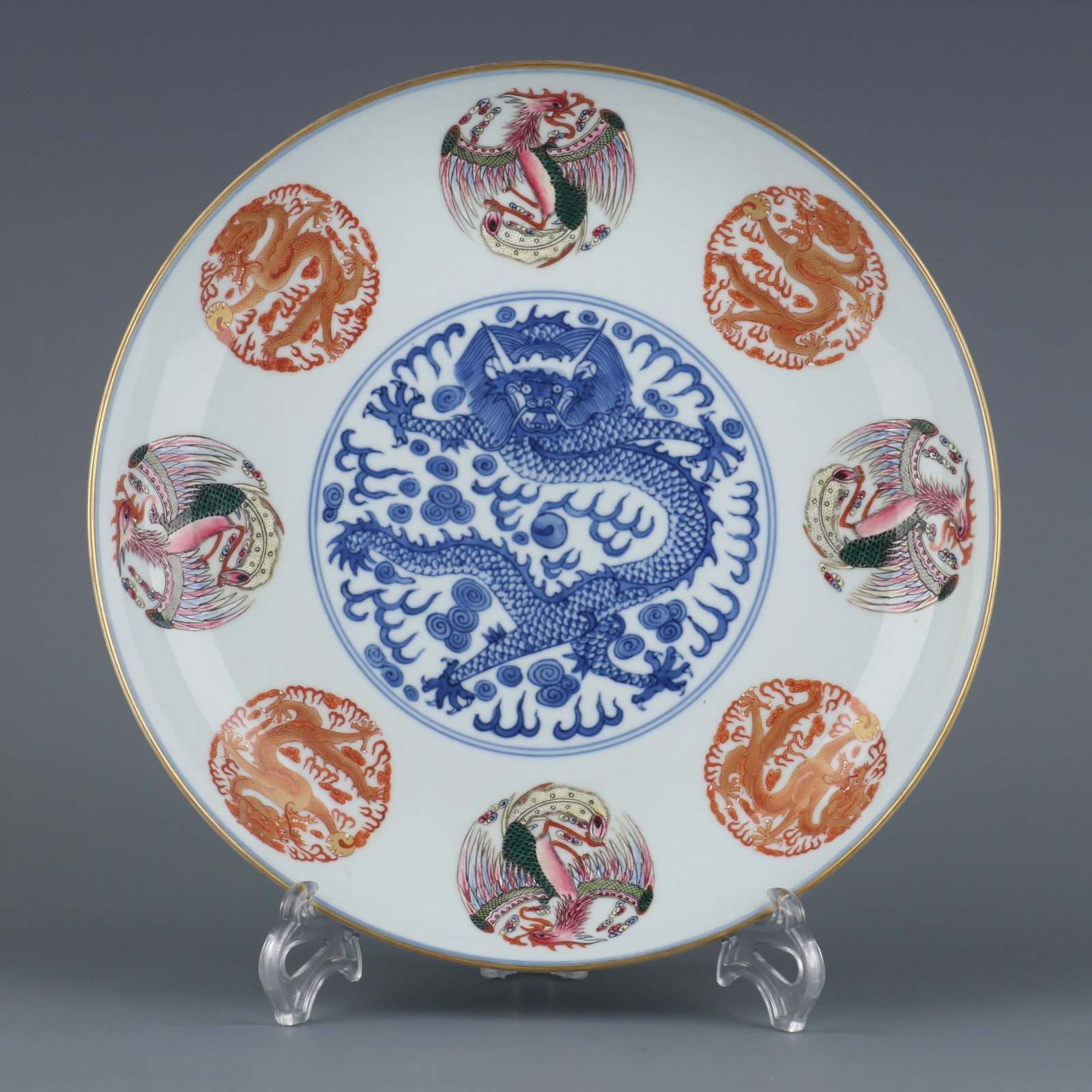 An Exquisite Blue and White Famille-Rose Painted Gold Auspicious Cloud and Dragon Pattern Plate: An Exquisite Blue and White Famille-Rose Painted Gold Auspicious Cloud and Dragon Pattern Plate,Qing Dynasty,China,Guangxu Six-character Mark,Size:2.1inx11.5in 青花粉彩描