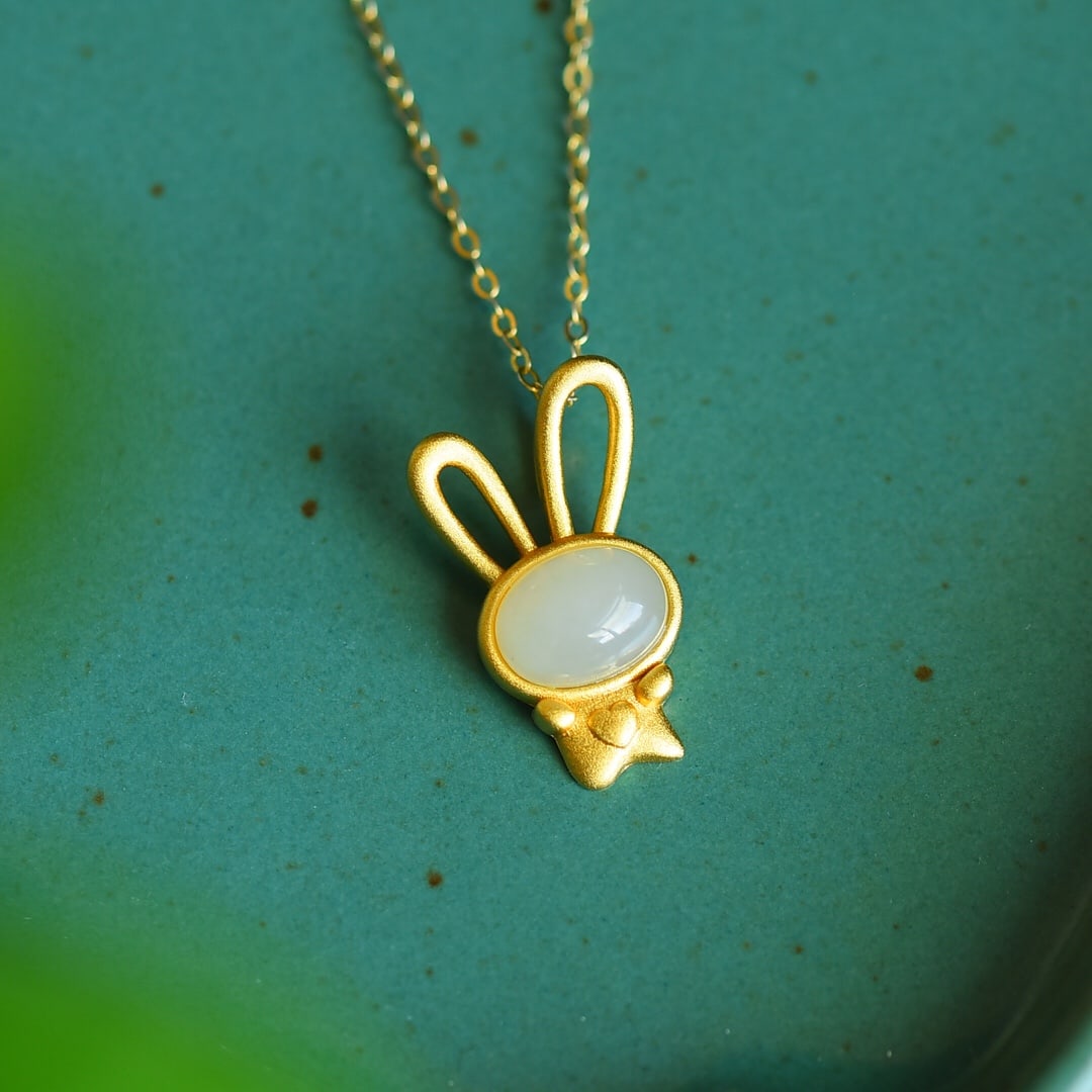 An Exquisite Sterling Silver-Gold Plated Inlaid White Jade Pendant: An Exquisite Sterling Silver-Gold Plated Inlaid White Jade Pendant 纯银镀金镶白玉吊坠