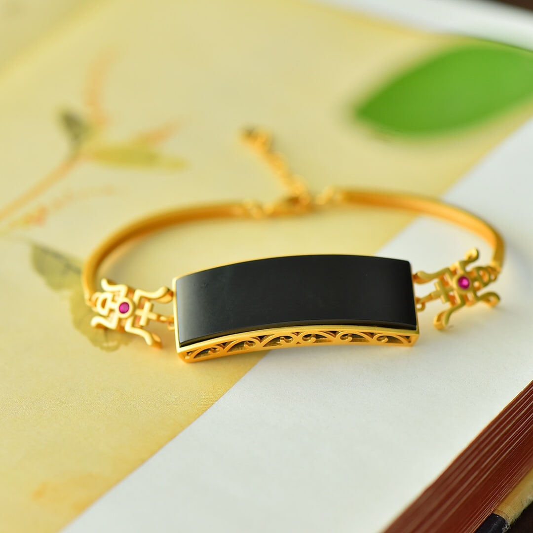 A Pair of Exquisite Sterling Silver-Gold Plated Inlaid Black Jade Bracelet: A Pair of Exquisite Sterling Silver-Gold Plated Inlaid Black Jade Bracelet,Size:0.5inx1.5in 纯银镀金镶墨玉手链