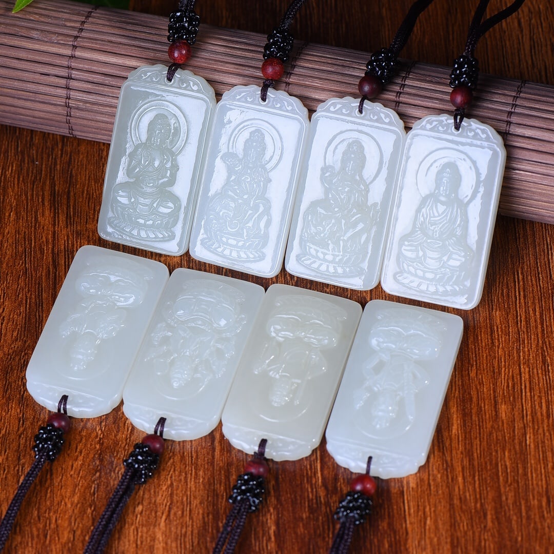 A Set of Fine White Jade Buddha Statue Pendant: A Set of Fine White Jade Buddha Statue Pendant,Size:1inx1.9in*8 一套白玉佛像挂件