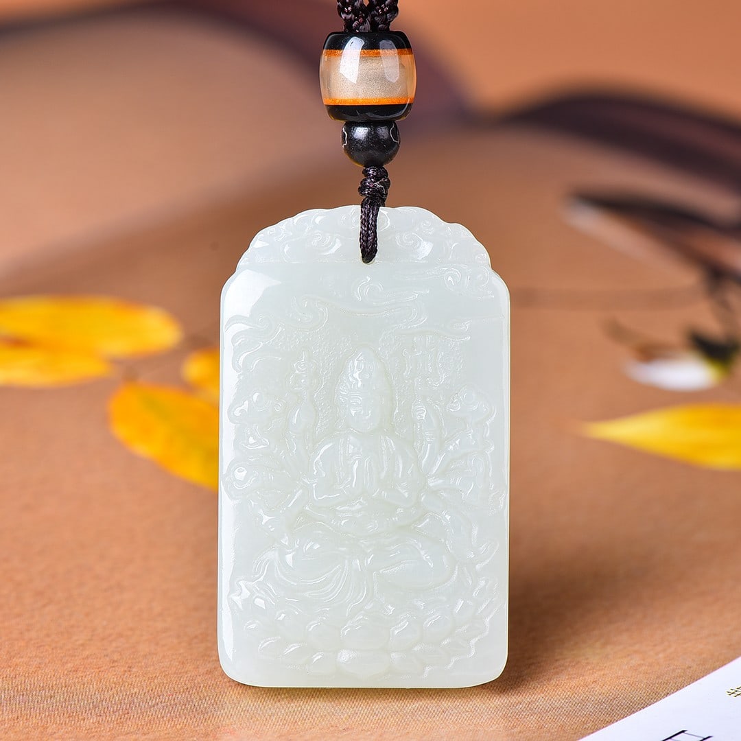 An Exquisite White Jade Statue of Avalokitesvara Pendant: An Exquisite White Jade Statue of Avalokitesvara Pendant,Size:1.2inx2in 白玉观音像挂件