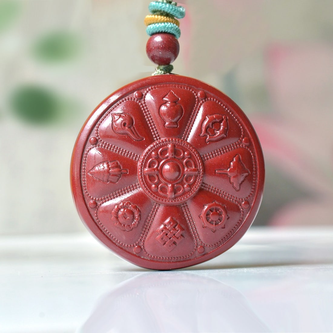 An Exquisite Cinnabar Eight Treasures Pattern Pendant: An Exquisite Cinnabar Eight Treasures Pattern Pendant,Size:1.3inx1.3in,Weight:45.9g 朱砂八宝纹挂件