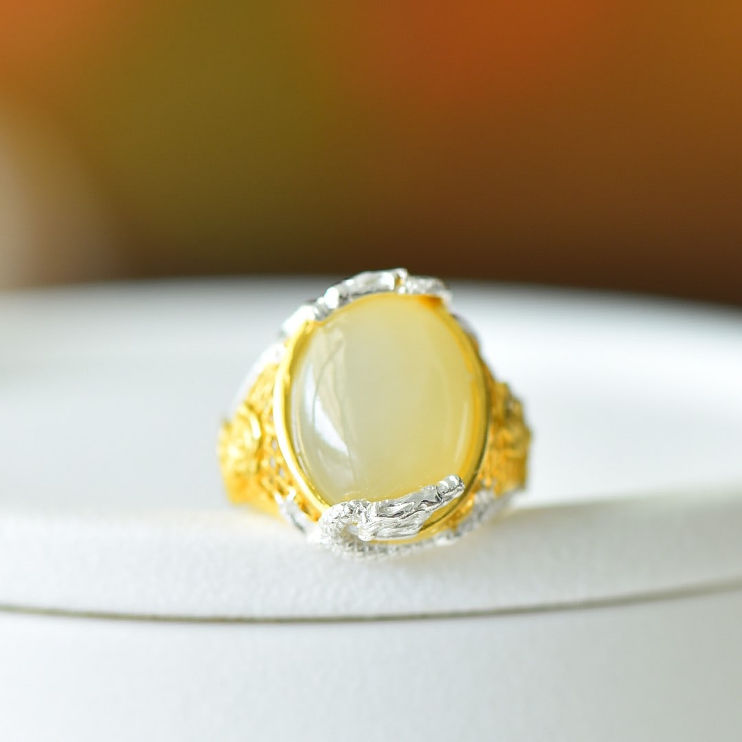 An Exquisite Sterling Silver-Gold Plated Inlaid White Jade Ring: An Exquisite Sterling Silver-Gold Plated Inlaid White Jade Ring,Size:0.5inx0.6in 纯银镀金镶白玉戒指