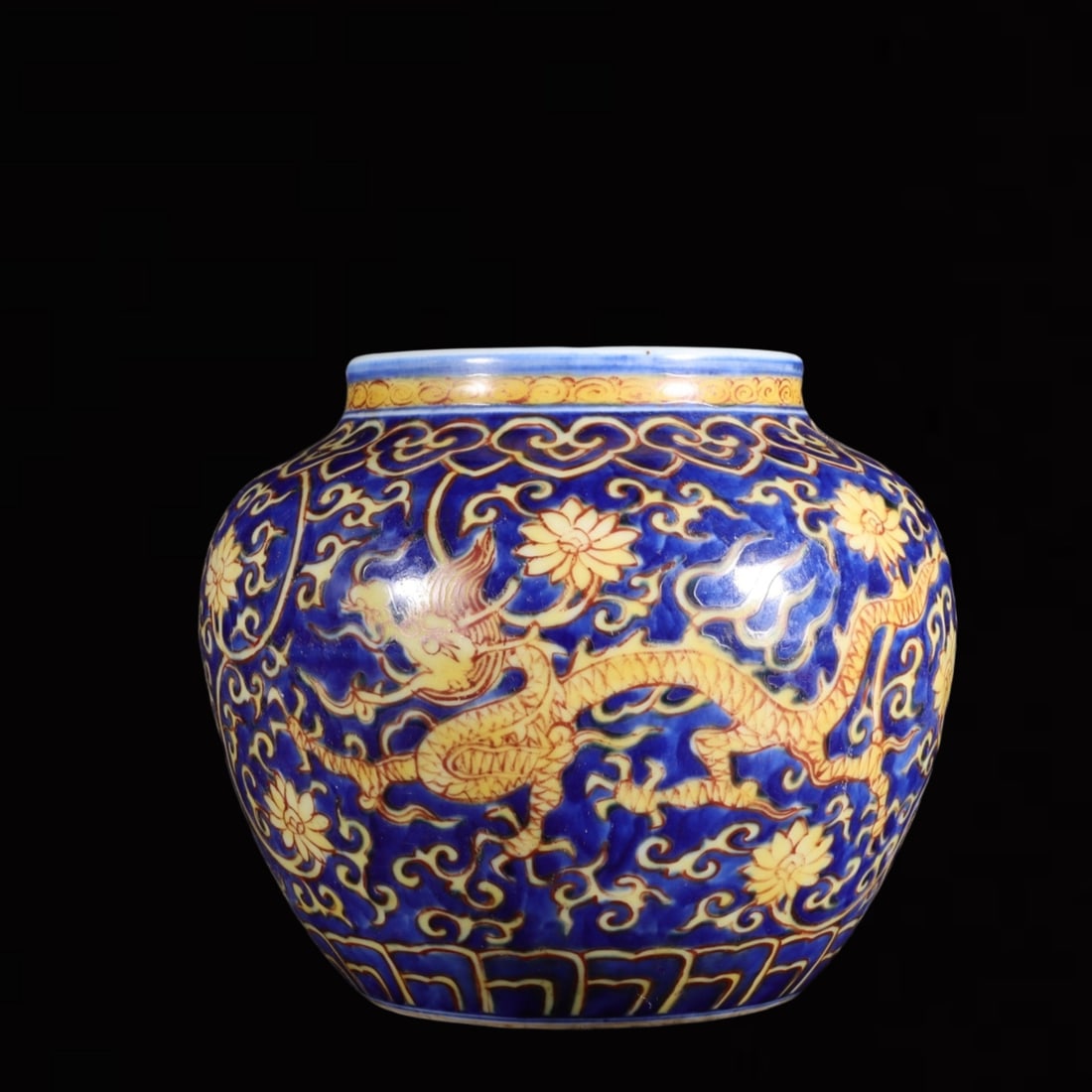 An Exquisite Red Ground Blue and White Dragon and Phoenix Pattern Double-Ears Vase: An Exquisite Red Ground Blue and White Dragon and Phoenix Pattern Double-Ears Vase,Ming Dynasty,China,Longqing Six-character Mark,Size:5.9inx3.5in 红地青花龙凤ń