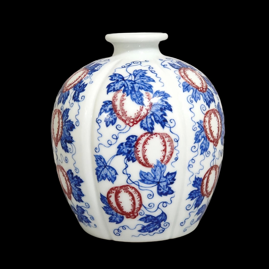 An Exquisite Blue and White Underglaze-Red Melon and Fruit Pattern Jar: An Exquisite Blue and White Underglaze-Red Melon and Fruit Pattern Jar,Qing Dynasty,China,Qianlong Six-character Mark,Size:4.5inx3.7in 青花釉里红瓜果纹&