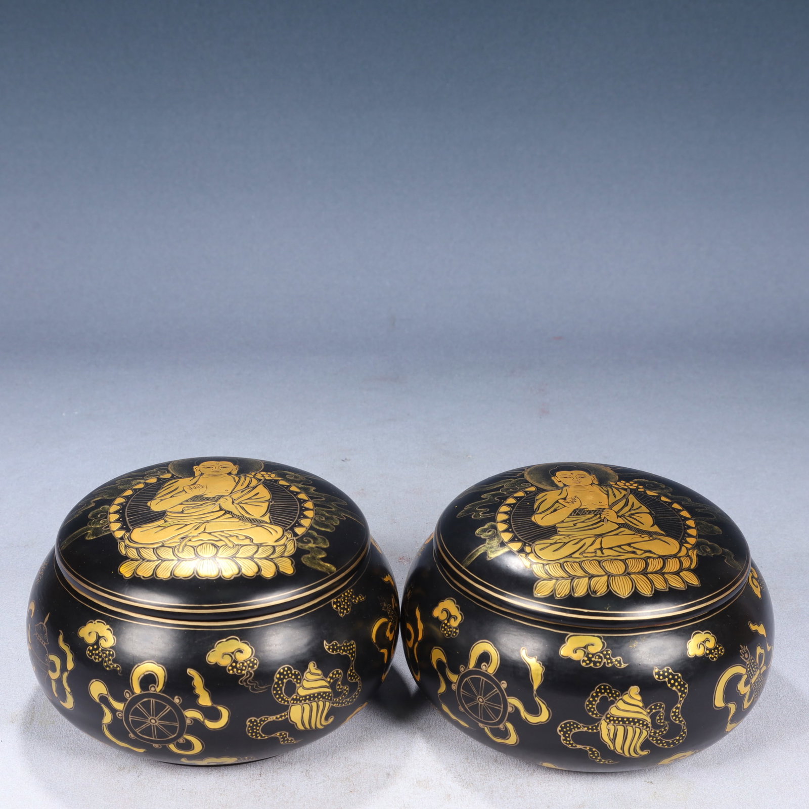 A Pair of Exquisite Black Lacquer Painted Gold Eight Treasures and Buddha Pattern Go: A Pair of Exquisite Black Lacquer Painted Gold Eight Treasures and Buddha Pattern Go,Qing Dynasty, China,Qianlong Four-character Mark,Size:6.3inx3.5in,Weight:2550g 一对黑漆