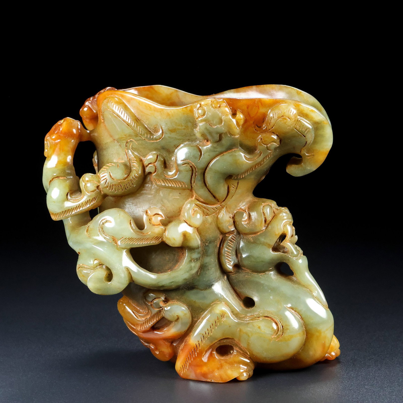 An Exquisite Archaic Jade Auspicious Beast Goblet: An Exquisite Archaic Jade Auspicious Beast Goblet,Ancient Time,China,Size:5.3inx5.5inx3.5in,Weight:1030g 高古玉瑞兽爵杯,中国远古ਲ