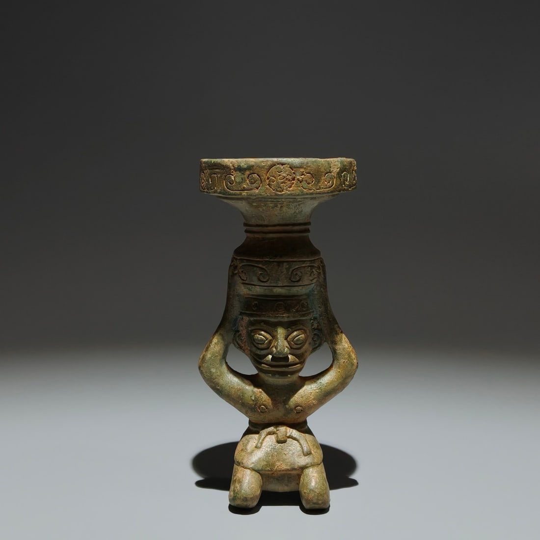 An Archaic Bronze Figure Ornament: An Archaic Bronze Figure Ornament,Shang Dynasty,China,Size:5.5inx2.6inx1.6in 青铜人物摆件,中国商代